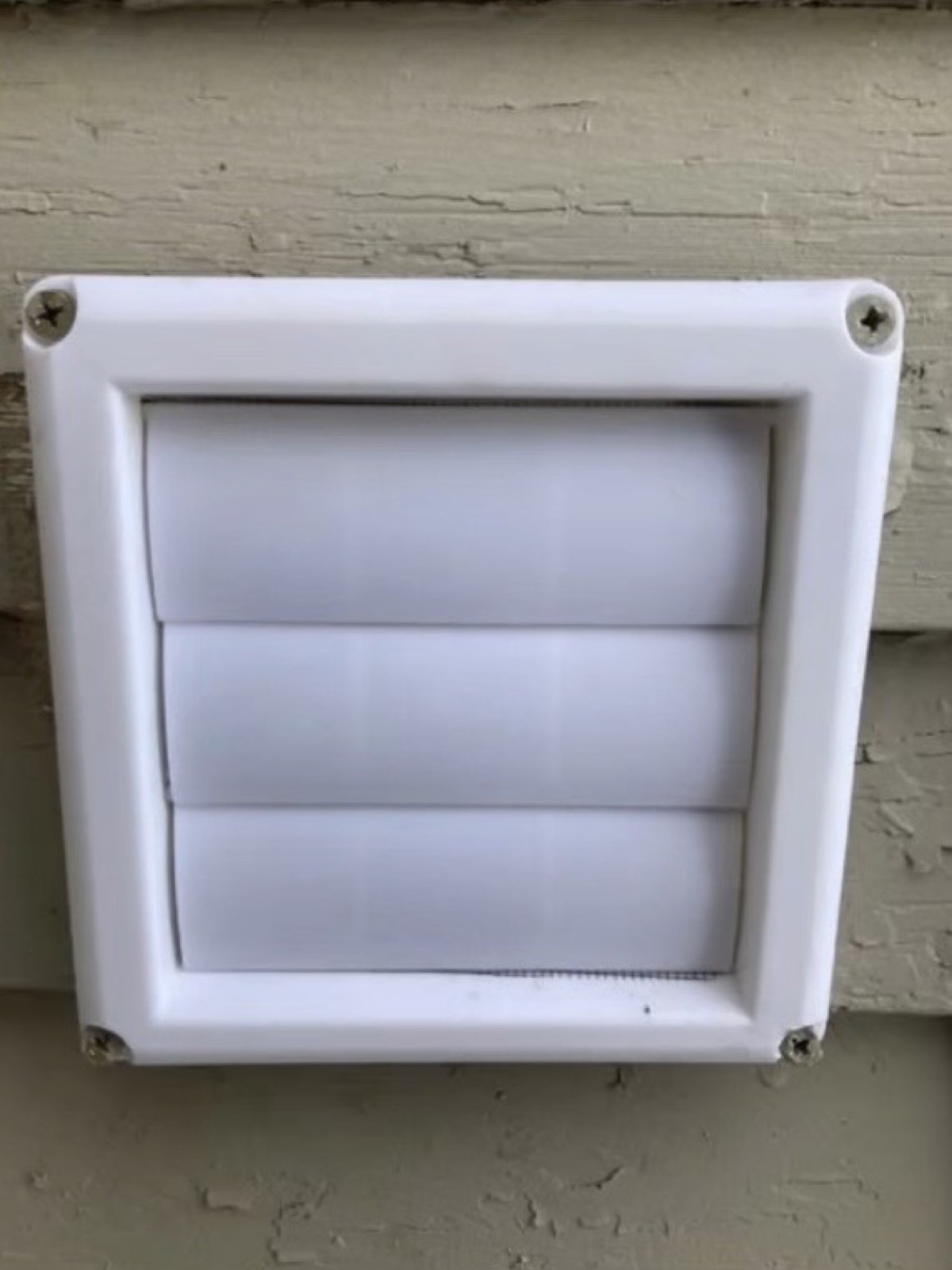 Clean exterior dryer vent cover after cleaning